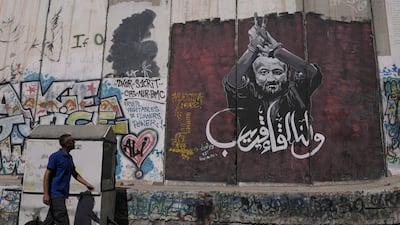 A mural of Marwan Barghouti on Israel's separation barrier in the West Bank city of Bethlehem. AP