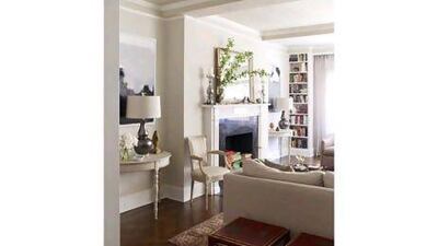 A half-moon table can be used as a desk or kitchen table in a starter home, then reclaimed as a telephone table or hallway accent in a bigger house. Photo by Lucas Allen