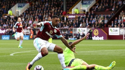 Andre Gray of Burnley battles with Dejan Lovren of Liverpool during the Premier League match at Turf Moor on Saturday, August 20, 2016. Jan Kruger / Getty Images