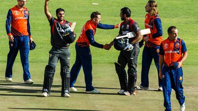 Chirag Suri, second left, celebrates after guiding the UAE to victory over the Netherlands. Courtesy ICC