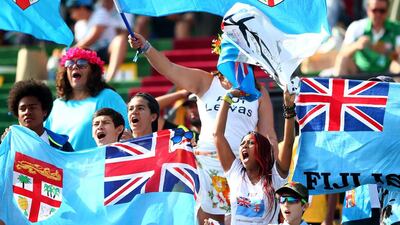 Fiji fans cheer for their team during the Emirates Airline Dubai Rugby Sevens on Saturday. Francois Nel / Getty Images