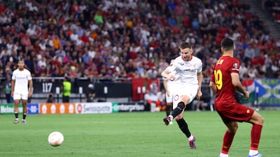 Ivan Rakitic of Sevilla shoots and hits the post. Getty