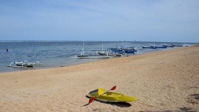 An empty beach at Sanur, near Denpasar on Indonesia's resort island of Bali on October 14, 2021, on the first day of the island's reopening to foreign tourists from 19 countries amid the Covid-19 pandemic. AFP