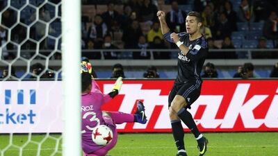 Real Madrid's Cristiano Ronaldo scores their second goal against Club America. Kim Kyung-Hoon / Reuters