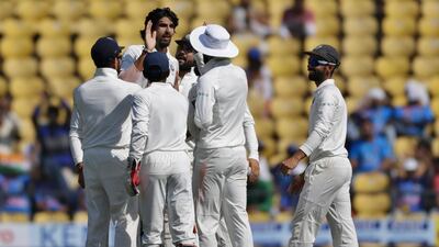 India fast bowler Ishant Sharma, centre, returned to form against Sri Lanka in the Nagpur Test. Rajanish Kakade / AP Photo
