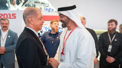 Sheikh Mohamed bin Zayed greets James Alix Michel, former President of Seychelles (L) at Shams Tower during the Abu Dhabi Grand Prix at Yas Marina Circuit.