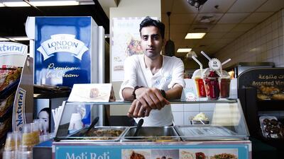 Tahir Shah, owner of Moti Roti, at one of his pop-ups in the Aswaaq supermarket, Knowledge Village, Dubai. Mr Shah says mobile kiosks and food trucks can greatly reduce overheads. Sarah Dea / The National