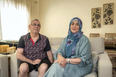 Adeeb Sami at his home in Al Ain with his wife Sana. Antonie Robertson / The National.
