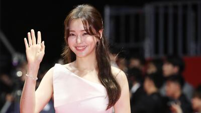 South Korean actress Lee Honey poses for a photograph as she arrives for the opening ceremony of the 24th Busan International Film Festival. EPA