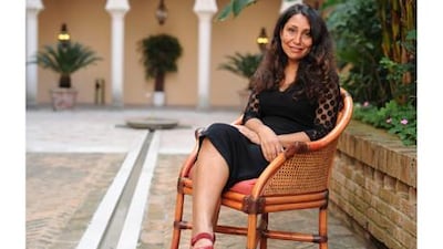 Film director of "Wadjda", Haifaa Al Mansour of Saudi Arabia, poses during a photo session at the 69th Venice Film Festival.
