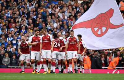 Nacho Monreal celebrates scoring for Arsenal against Brighton on Sunday. Tony O'Brien / Reuters