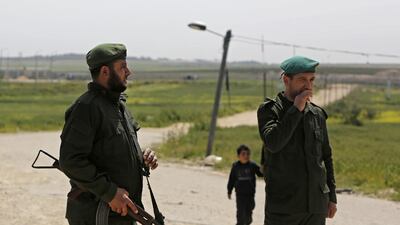 Palestinian Hamas security forces keep watch near the Israel-Gaza border. AFP