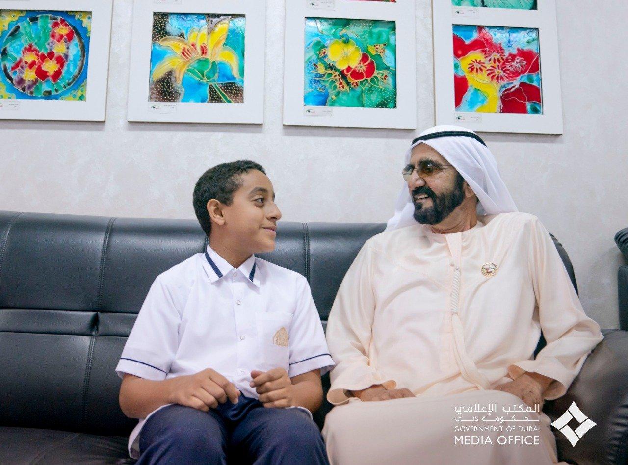 Sheikh Mohammed bin Rashid, Vice President and Ruler of Dubai, visits Khalifa Al Kaabi at Al Qudwa School to thank him for saving his schoolmates after their bus caught fire. Courtesy Dubai Media Office