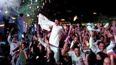 People celebrate in Doha following Qatar's selection as the host of the 2022 Fifa World Cup last year.