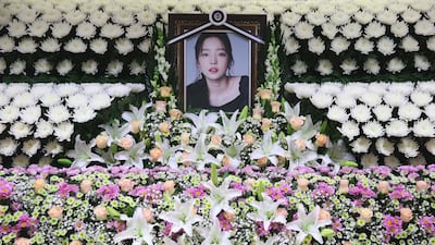 K-pop star Goo Hara's portrait at a memorial altar at a hospital in Seoul. AFP