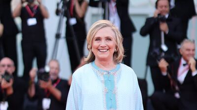 Hillary Clinton wears a blue kaftan. Getty Images