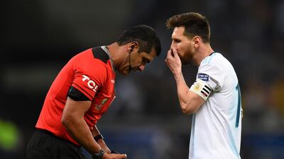 Referee Roddy Zambrano and Lionel Messi during the Copa America semi-final between Argentina and Brazil. Getty Images