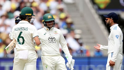 Australia's Sam Konstas, left, and India's Virat Kohli, right, exchange words after a flareup on teh opening day of the Melbourne Test. AFP