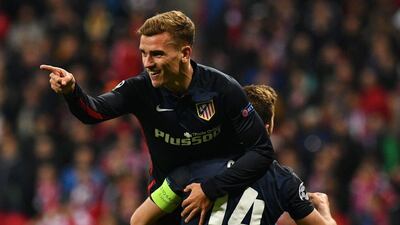 Atletico Madrid striker Antoine Griezmann celebrates his goal against Bayern Munich. Michaela Rehle / Reuters