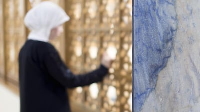 Rana and her three young children were deserted by her husband and now sleep in a car or at a friend’s home. She makes a meagre living selling abayas on the streets of Sharjah and cannot get a proper job because her husband has her documents. Reem Mohammed / The National