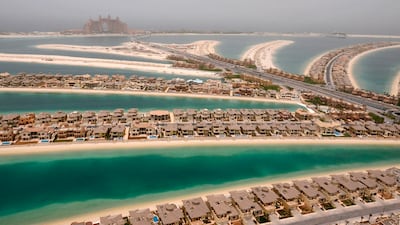 Construction work continued at a fast pace on Palm Jumeirah with villas built by 2008. Reuters