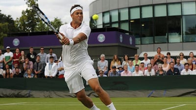 Great Britain's Marcus Willis in action against Lithuania's Ricardas Berankis. REUTERS/Stefan Wermuth