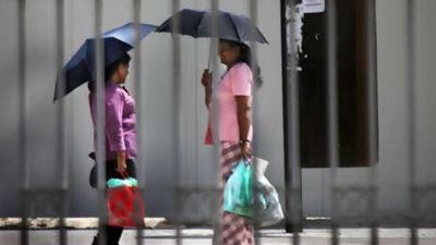 Abu Dhabi residents try to beat the heat yesterday.