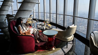 Guests are seen at the J Hotel, the world's highest luxury hotel.
