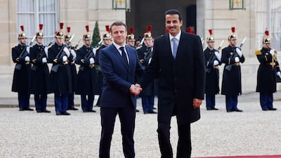 The leaders pose for the cameras. AFP