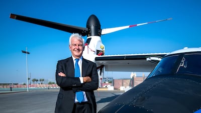 Alessandro Profumo, CEO of Leonardo at the Expo 2020 Dubai helicopter terminal with the AW609 TiltRotor aircraft. Victor Besa/The National.