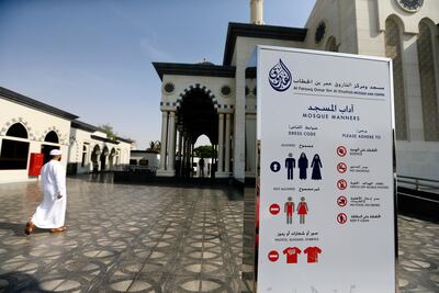 Signs informing people of the dress code are posted outside Al Farooq Omar Ibn Al Khattab Mosque in Jumeirah in Dubai. Sarah Dea / The National