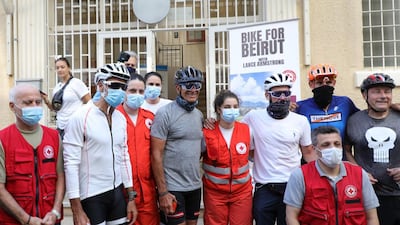 Lance Armstrong with members of the Red Cross. Courtesy Fares Sokhn