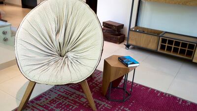 The swaddle chair: a hand-stitched, vegetable-dyed leather seat with a built-in blanket that embraces you as you sit down. Ruel Pableo for The National