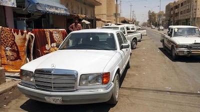 Fallujah in 2003, after the fall of the Saddam government – the regime that provides the backdrop to parts of Muhsin Al-Ramli’s novel. Stan Honda / AFP