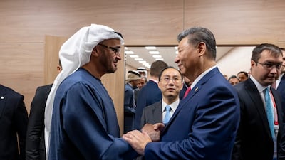 President Sheikh Mohamed meets Mr Xi during the Brics summit in Kazan, Russia, on Wednesday October 23. Photo: UAE Presidential Court