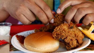 People are more likely to crave unhealthy foods during periods of stress. Ravindranath K / The National