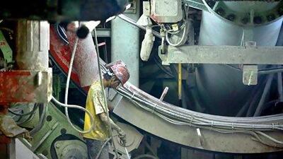 A worker in one of Samsung C&T's tunnel-boring machine being used for the 919 section of Seoul Metro's Line 9 extension. Seong Joon Cho for The National