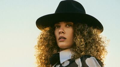 Dress, Dh17,700; and hat, Dh2,200, both from Dolce & Gabbana