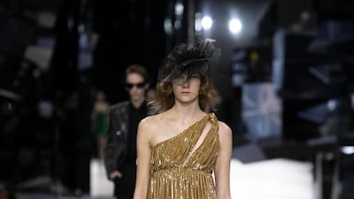 Designer Hedi Slimane returned to the runway with his first show as creative head of Celine. Celine
