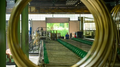 A coil of seamless drawn smooth tubes made of copper alloys at the MPG tubes plant in Menden, western Germany, on June 18. AFP