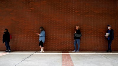 People who lost their jobs wait in line to file for unemployment benefits, following an outbreak of the coronavirus disease, at Arkansas Workforce Centre in Fort Smith, Arkansas, US. Reuters