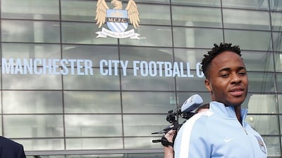 New Manchester City signing Raheem Sterling leaves the club's Etihad Stadium on Tuesday after completing his move from Liverpool. Andrew Yates / Reuters / July 14, 2015