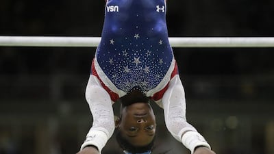 United States’ Simone Biles performs on the uneven bars during the women’s gymnastics individual all-around final at the 2016 Rio Olympics at Rio Olympic Arena on August 11, 2016 in Rio de Janeiro, Brazil. Dmitri Lovetsky / AP Photo