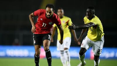 12 Egypt || The look: The best kit from the region belongs to Egypt. True, it's an Adidas identikit, but the colour scheme is a classic and it will look even better with Mohamed Salah in it. Fingers crossed. || Would I wear it? Like a Pharoah || Photo: Marco Bertorello / AFP Photo