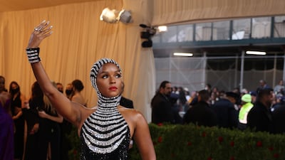 Janelle Monae, wearing a hooded rhinestone Ralph Lauren halter dress with a mermaid skirt, on the red carpet for the 2022 Met Gala on May 2, 2022. EPA