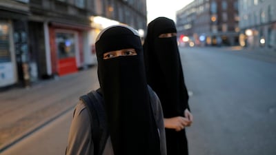 Sabina, 21 and Alaa, 22, wear niqabs in the Norrebro neighbourhood of Copenhagen, Denmark, on July 30, 2018, ahead of the August 1 ban on face covering. Reuters