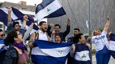 Nicaraguans in exile in Costa Rica celebrate in San Jose, after Nicaragua freed more than 200 political prisoners. AFP
