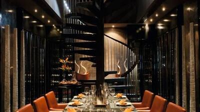 Toro Toro is a striking restaurant, with a floor-to-ceiling fireplace, oversized vases and several large sculptures.