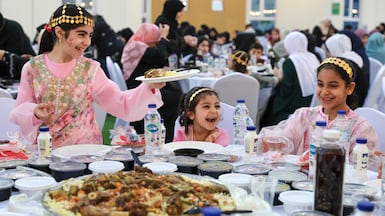 Thousands of Gazans attend an iftar at Emirates Humanitarian City in Abu Dhabi. Victor Besa / The National