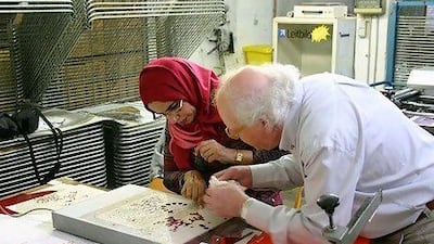 Karima Al Shomely learning an oil-based printmaking technique in Germany. Courtesy of Daman